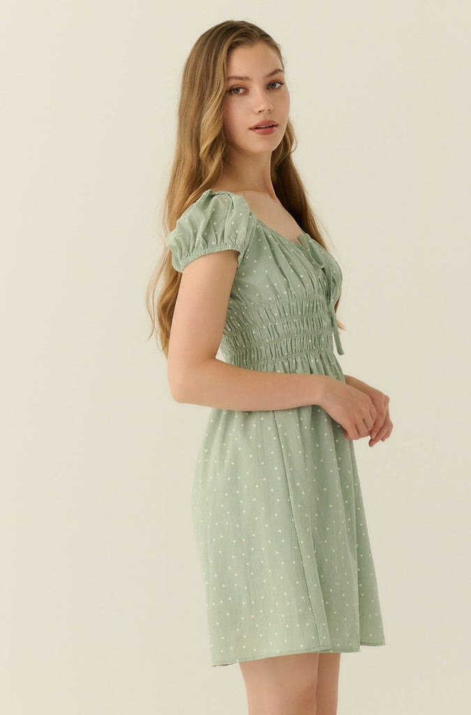 Green polka dots mini dress
