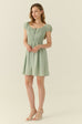 Green polka dots mini dress