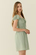 Green polka dots mini dress