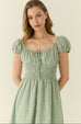 Green polka dots mini dress