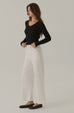 Floating free V neck knit top