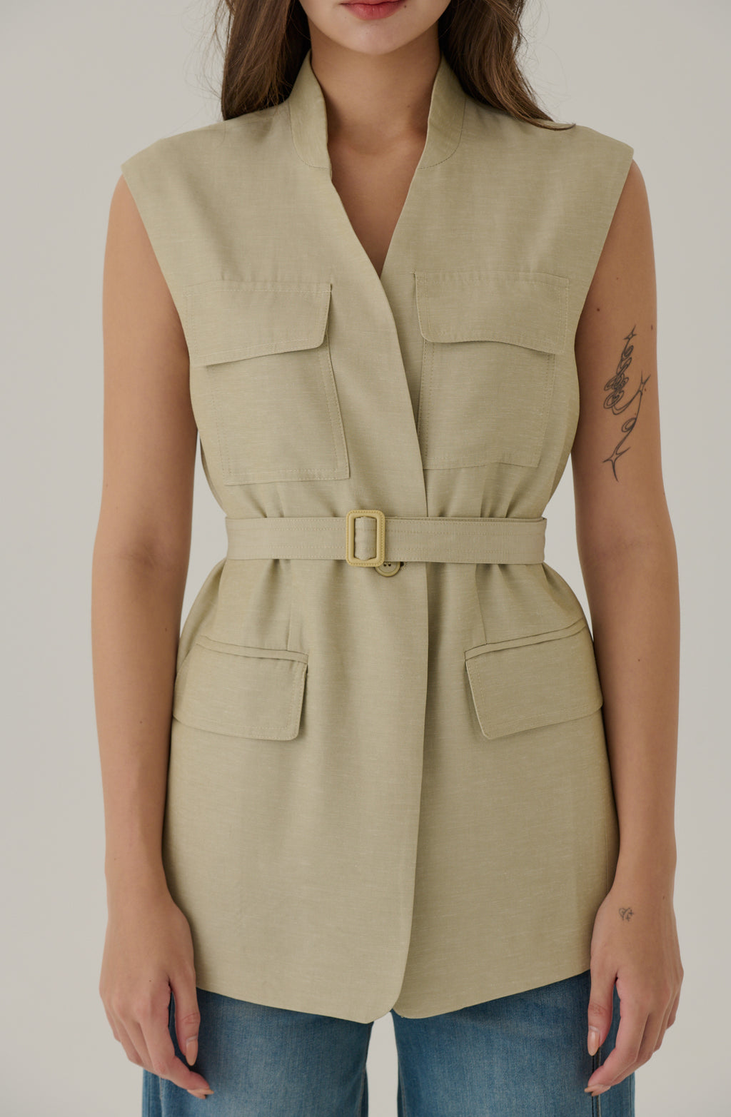 Capable woman sleeveless blazer